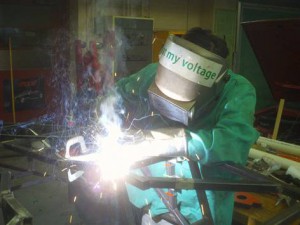 Student welding the vehicle chassis